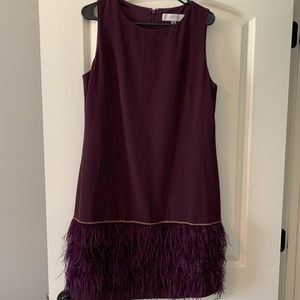 Plum contemporary dress with feather trim
